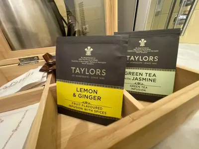 two boxes of hemp and ginger on a wooden shelf at Stay at Premium Syntagma Location in Athens