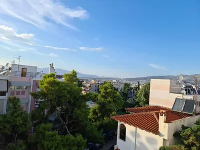 a view of a city with buildings and trees at ''Athens Light'' luxury spacy appartment, Agia Paraskevi in Athens