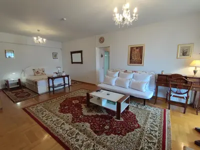 a living room with a couch and a table at ''Athens Light'' luxury spacy appartment, Agia Paraskevi in Athens