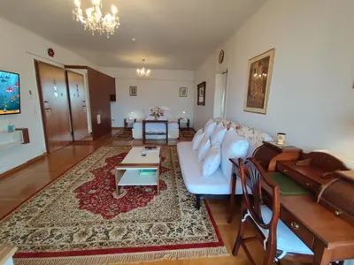 a living room with a couch and a table at ''Athens Light'' luxury spacy appartment, Agia Paraskevi in Athens