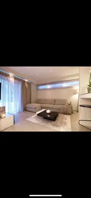 a large bedroom with a bed and a couch at Small Villa in Palaio Psichiko in Athens