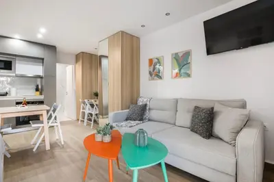 a living room with a couch and a table at Halo - Luxury Studio in Athens in Athens