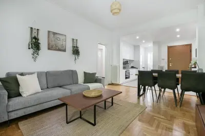 a living room with a couch and a table at Mellow 2-Bedroom Apartment in Athens in Athens