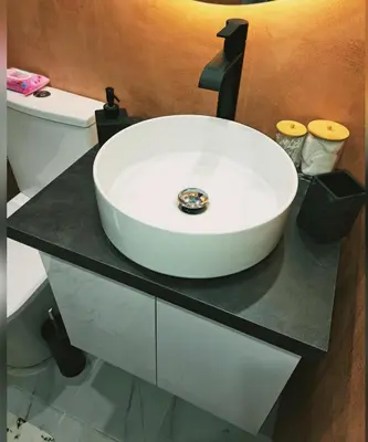 a white sink on top of a counter in a bathroom at Horizon view apartment port of Piraeus in Piraeus