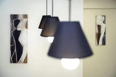 a group of lights hanging on a wall at Urban Elegance Retreat VIPGreece in Athens