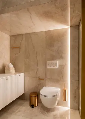 a bathroom with a white toilet in a room at Elegant apartment a breath away from the Acropolis in Athens