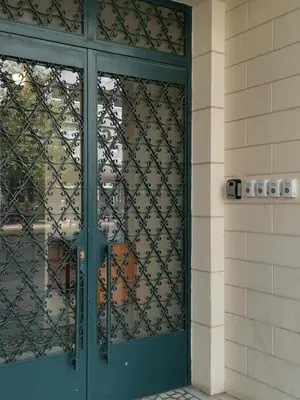 a door to a building with wrought iron at Gargaretta Suites Wildflower 4 Acropolis Museum District in Athens