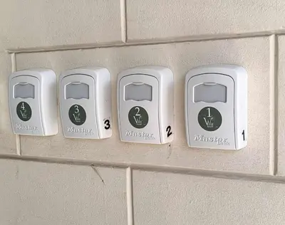 four electrical outlets on a wall in a bathroom at Gargaretta Suites Wildflower 4 Acropolis Museum District in Athens