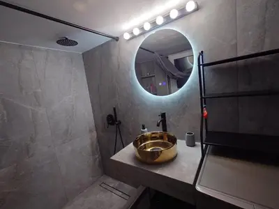 a bathroom with a bowl sink and a mirror at V32 - Athens Central Fully Equipped Apartment in Athens