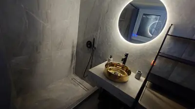 a bathroom with a sink and a mirror at V32 - Athens Central Fully Equipped Apartment in Athens