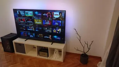 a flat screen tv sitting on a stand in a room at V32 - Athens Central Fully Equipped Apartment in Athens