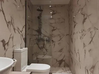 a bathroom with a shower and a toilet and a sink at Cozy Studio in Zografou, close to hospitals in Athens