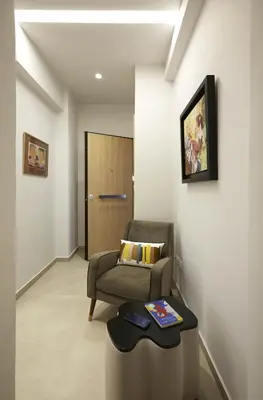 a living room with a couch and a table at Filolaou Athens Luxury Apartment by Mystery in Athens