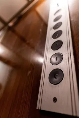 a remote control sitting on top of a wooden table at Historical center Athens amazing studio in Athens