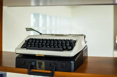 a computer keyboard sitting on top of two suitcases at Inviting Flat near Acropolis in Athens