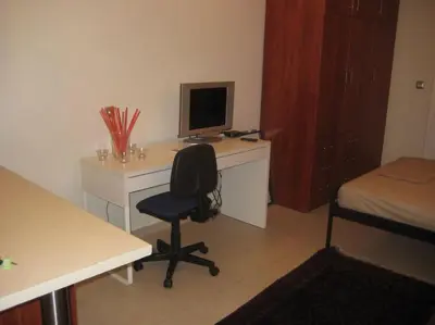 a room with a desk with a computer and a chair at Μοντέρνος χώρος στο κέντρο της πόλης in Athens