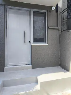 a front door of a house with a window at Microhome in Philopappos Hill in Athens