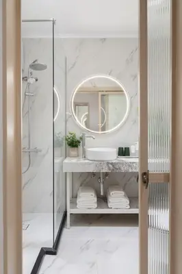 a bathroom with a sink and a mirror at M18 Studios Monastiraki Gems in Athens