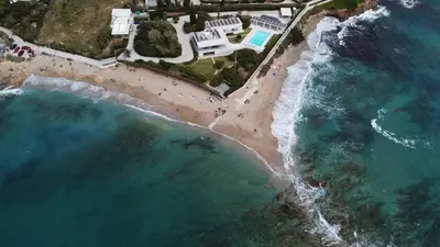 an aerial view of a beach and the ocean at Vintage house by the sea in althea in Aghia Marina