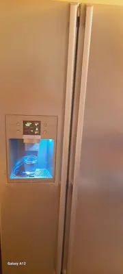 a refrigerator with a bowl inside of an oven at Dimis Apartment in Athens