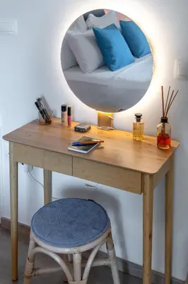 a desk with a chair and a mirror at The rock view apartment in Athens
