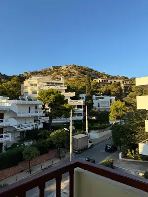a view of a city from a balcony at The rock view apartment in Athens