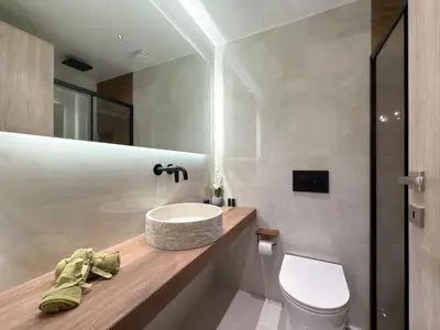 a bathroom with a sink and a toilet at A modern temple of Athena 1 & 2 in Athens