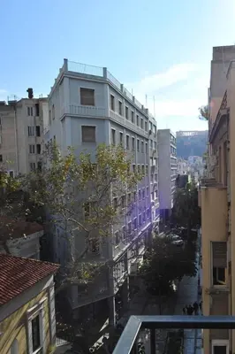 a view of a city with tall buildings at My Athens House in Athens