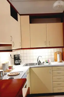 a kitchen with a sink and a stove at RELAX & RECHARGE apartment 1 in Athens