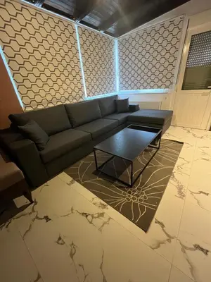 a living room with a couch and a coffee table at Panos Loft With Acropolis View in Athens