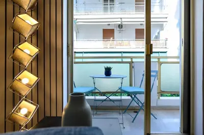 a view of a balcony with a table and chairs at Luxury 2 bed Urban Oasis in the Heart of Athens in Athens