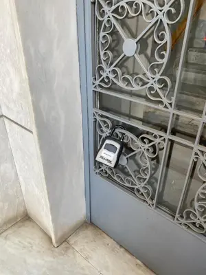 a cell phone sitting on a window sill at Veli's Apartment in Athens