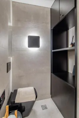 a bathroom with a sink and a toilet in a room at Syntagma Luxe Loft in Athens