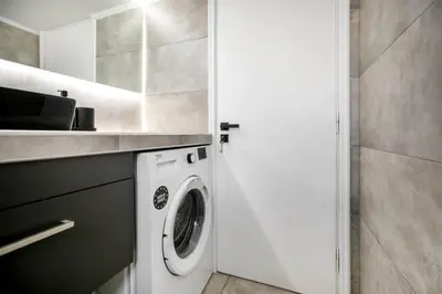 a white washer and dryer in a kitchen at Dew 1-Bedroom Apartment in Athens in Athens