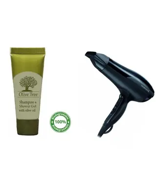 a pen and a bottle of olive tree shampoo at 2 Bedroom Apartment Athens - Kallimarmaro in Athens