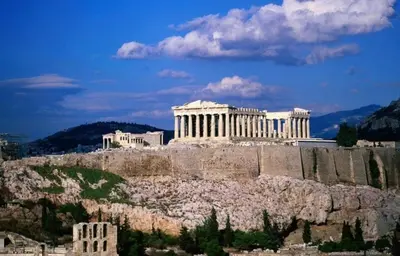 a view of the acropolis of athens with a building at 2 Bedroom Apartment Athens - Kallimarmaro in Athens