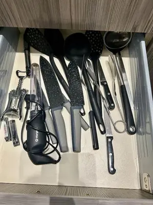 a drawer filled with lots of kitchen utensils at Miromar in Athens