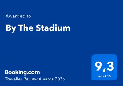 a blue screen with the text awarded to by the stadium at By The Stadium in Athens