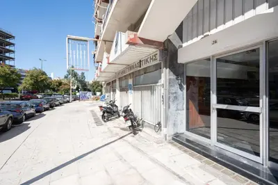 a couple of motorcycles parked outside of a building at City View Penthouse with Large Terrace in Athens