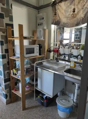 a kitchen with a sink and a counter top at Υπέροχη θέα in Athens