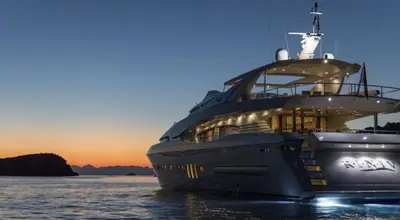 a large boat in the water at sunset at Luxury Yacht RINI V in Athens