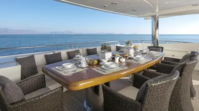a table on the deck of a yacht at Luxury Yacht RINI V in Athens
