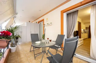 a small dining room with a table and chairs at Athens Homster in Athens