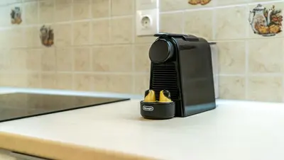 a toaster sitting on top of a kitchen counter with shoes at Athens Homster in Athens