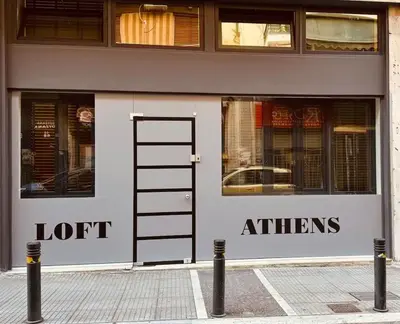 a store front with a ladder in front of it at Loft Athens 2 - 55m2 in Athens