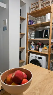a bowl of fruit sitting on top of a table at Heart of Faliro 2BR 5m Walk to Beach - Newly Renovated in Athens