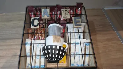 a wire rack with a toothbrush and toothpaste at Central Lux Lining B in Athens