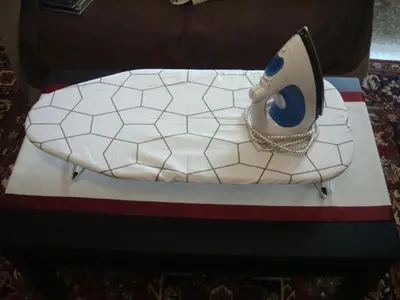 a cake shaped like a purse on a table at 500Mbps WiFi Budget Studio 1min from Attiki metro station in Athens