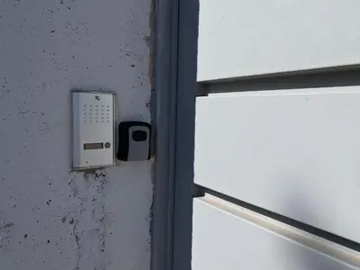 a switch on a wall next to a window at Fanis Rooms in Aghia Marina