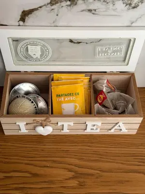 a wooden box with various items in it at Acropolis Harmony Loft in Athens